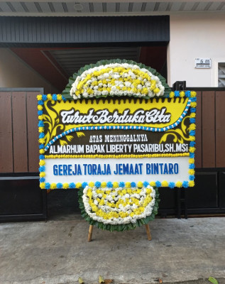 Papan Bunga Duka di Teiraplu